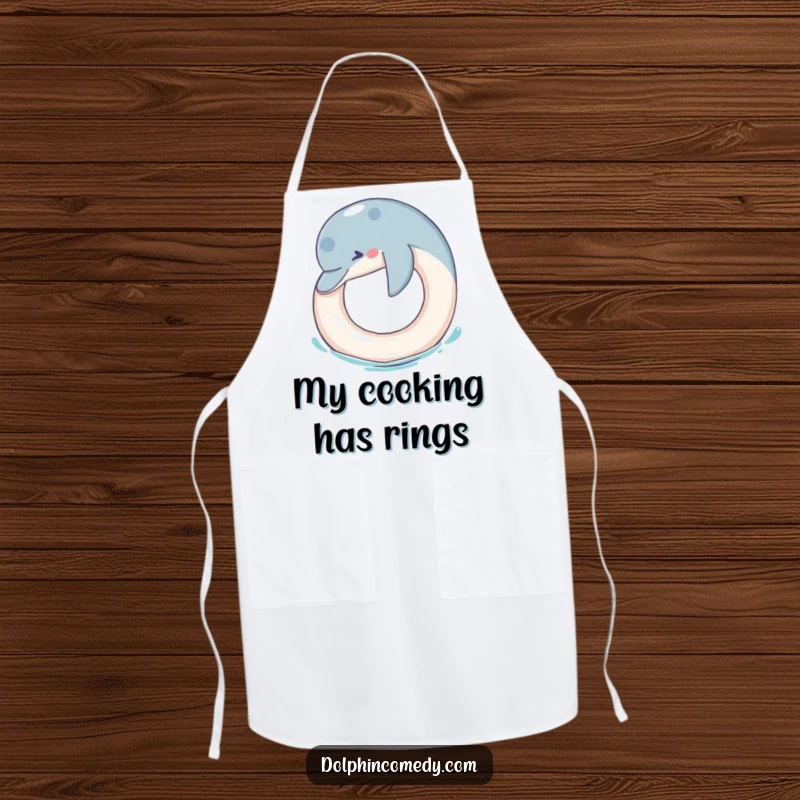 Funny Apron: A humorous dolphin is depicted playing with a floating ring, perfect for kitchen fun and a guaranteed laugh.
