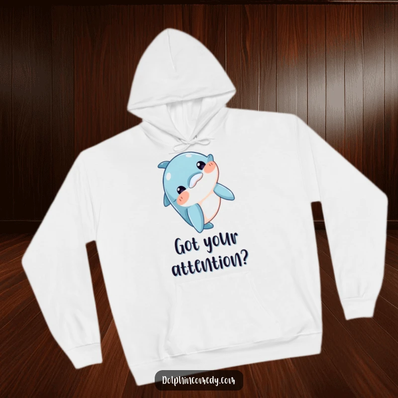 Funny Hoodie depicting a curious dolphin character bobbing its head, inviting interaction, perfect for cozying up, an ideal funny gift.