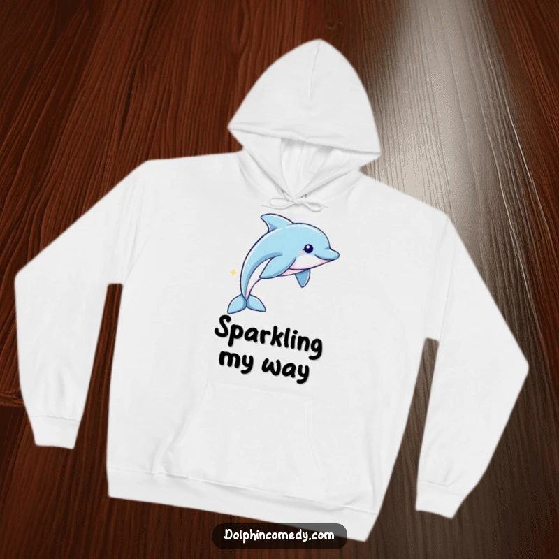 Funny Hoodie: A dolphin swims, leaving a sparkling trail, designed for cozy wear and whimsical appeal.
