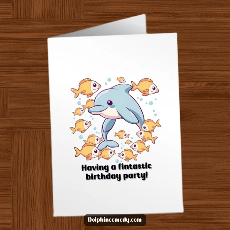 Funny Free Printable Birthday Card: A dolphin swimming happily with a school of playful fish, celebrating friendship and fun.
