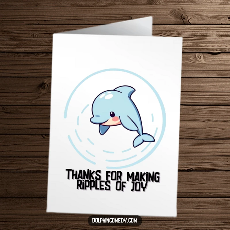Funny free printable thank you card featuring a dolphin swimming in circles, creating delightful ripples to express thanks.