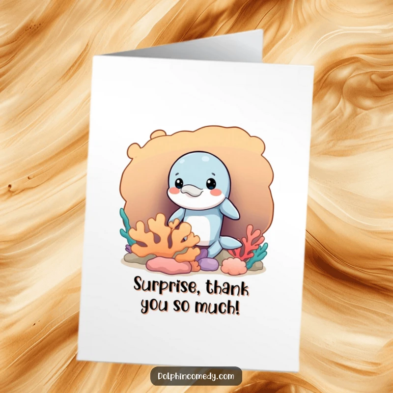 Funny Free Printable Thank You Card: A dolphin playfully peeks from behind a large coral formation.