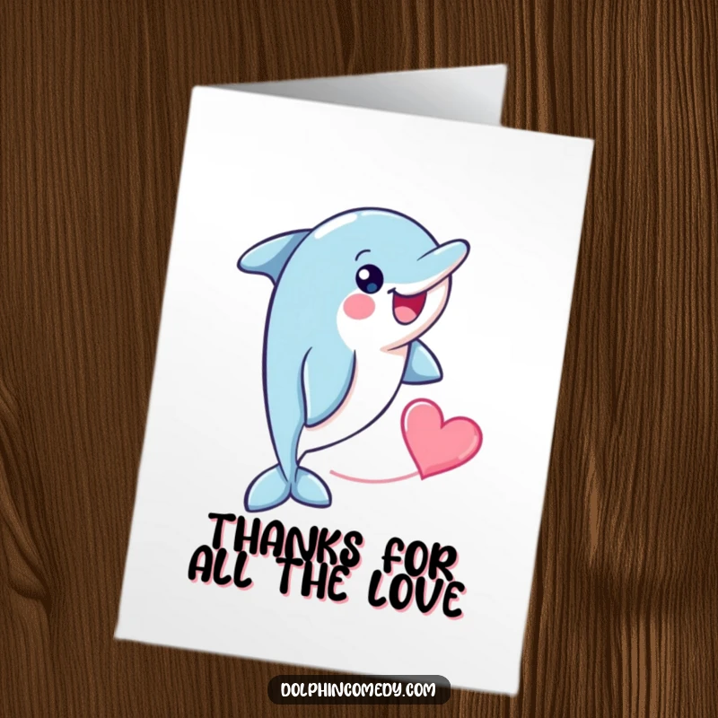 Funny Free Printable Thank You Card: A cheerful dolphin swims by, leaving a lovely heart shape behind.