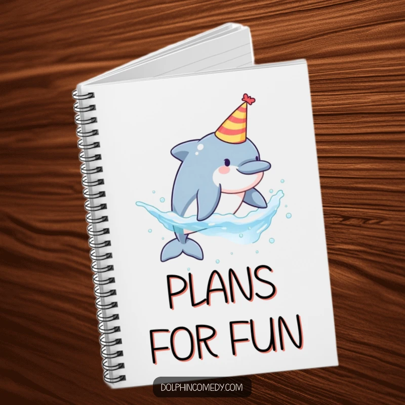 Funny notebook featuring a dolphin in a party hat, splashing water, ideal for journaling and planning.