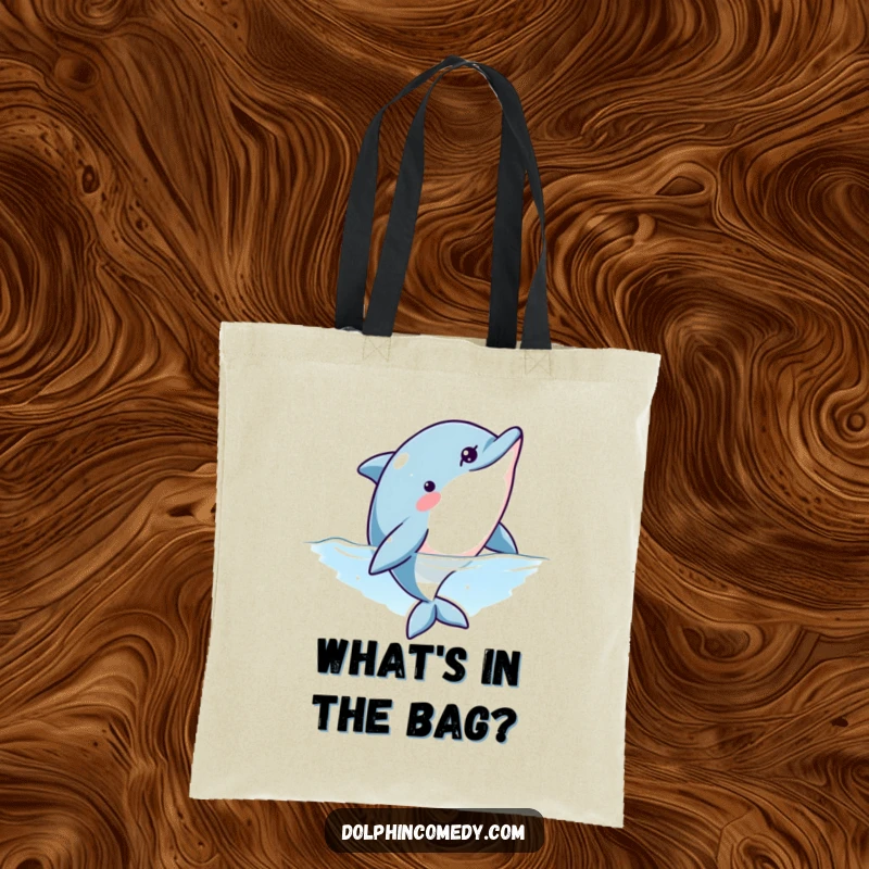 Funny tote bag designed with a curious dolphin peeking upwards, ideal for carrying items with a splash of oceanic intrigue.