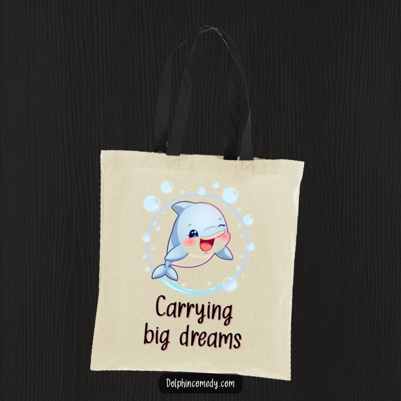 Funny dolphin with sparkling eyes mid-leap through a bubble hoop, featured on a durable tote bag for aquatic humor.