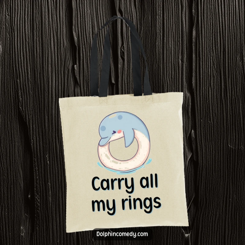 Funny Tote Bag: A humorous dolphin is shown playfully nudging a floating ring, ideal for carrying essentials with a smile.