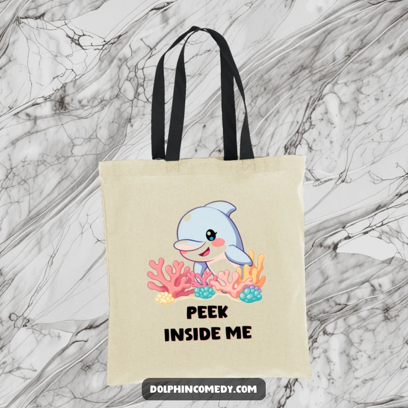 Funny dolphin with a cheerful smile peeking from behind a vibrant coral reef, a humorous tote bag for carrying essentials.